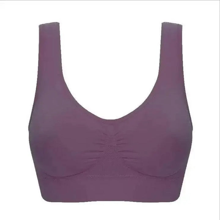 Purple seamless sports bra with wide straps, available at OurLum.com for lifestyle comfort.